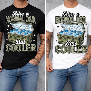 May include: Black and white t-shirts with the text "Like a NORMAL DAD, But COOLER" and a graphic of a cooler filled with blue cans. The cooler has a camouflage pattern. The shirts are worn by a person.