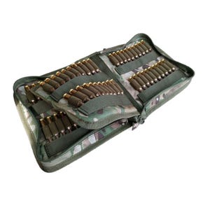 May include: A camouflage-patterned ammunition storage wallet featuring multiple internal elastic loops. The open case displays rows of brass-cased cartridges secured in place by olive green webbing straps, with a zippered closure along the edge.