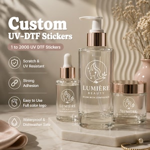 May include: Clear glass cosmetic containers with rose gold caps featuring custom UV-DTF stickers with the Lumière Beauty logo. Text includes Custom UV-DTF Stickers, 1 to 2000 UV DTF Stickers, Scratch & UV Resistant, Strong Adhesion, Easy to Use, and Waterproof.
