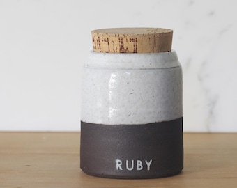 brown clay custom pet urn or human ashes urn, with cork lid.