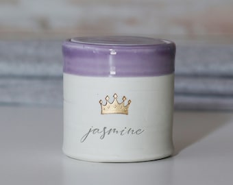 Custom pet urn for ashes. purple personalized cursive name shown with gold crown vitrifiedstudio
