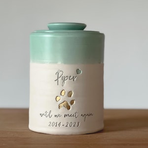 Personalized Pet Urn: Modern Ceramic Urn with Paw Print Upgrade shown