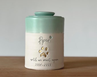 custom pet urn with optional custom pawprint upgrade. modern simple urn for ashes. Personalized name and optional custom paw