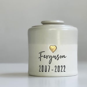 custom pet urn. modern simple personalized name and date urn for ashes. Made By vitrifiedstudio