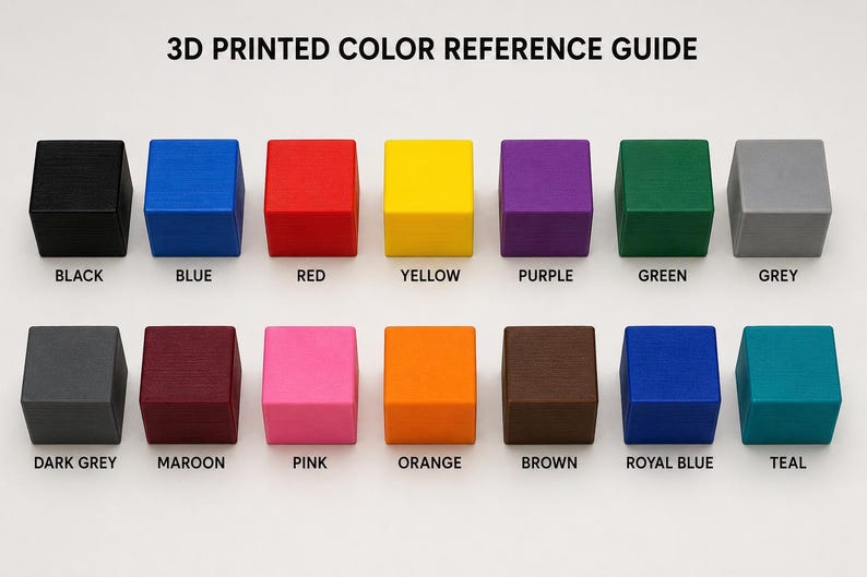May include: A 3D printed color reference guide featuring a series of small, square blocks in various colors. The blocks are labeled with color names such as black, blue, red, yellow, purple, green, grey, dark grey, maroon, pink, orange, brown, royal blue, and teal.
