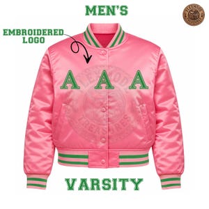 May include: Pink varsity jacket with green and white striped trim. The jacket features the word "VARSITY" and the word "MEN'S" in green. The jacket has green embroidered letters "A A A" on the front and an embroidered logo.