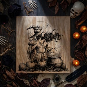 May include: A square wooden plaque featuring a detailed black ink illustration of a witch wearing a pointed hat, stirring a bubbling cauldron with a wooden spoon. The scene includes pumpkins, a full moon background, and flowing hair.