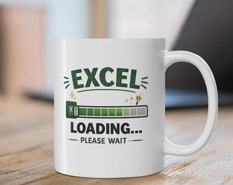 May include: A white ceramic mug featuring a green graphic of the word EXCEL above a loading bar icon. Below the bar, the text reads LOADING... PLEASE WAIT. The design includes small star accents and horizontal lines, presented in a clean, simple style.