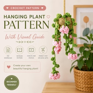 May include: A crochet pattern for a hanging plant with text reading CROCHET PATTERN, HANGING PLANT PATTERN, With Visual Guide, PDF DOWNLOAD, DETAILED PATTERN, STEP-BY-STEP PHOTOS, PERFECT FOR DECOR & GIFTS, Create your own beautiful hanging plant!, BEGINNER FRIENDLY. The image shows a crocheted plant with green vines and pink flowers in a tan pot.