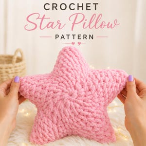 May include: A soft, light pink star-shaped pillow made with chunky crochet yarn. The text above the pillow reads CROCHET Star Pillow PATTERN. The pillow features a dense, textured stitch pattern that radiates from the center point outward.