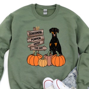 Doberman Halloween Sweatshirt. Fall Doberman Sweatshirt. Doberman Pinscher Halloween Shirt. Natural Ears Doberman Gifts. Autumn Dobie Shirt. Military Green