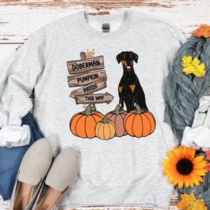 Doberman Halloween Sweatshirt. Fall Doberman Sweatshirt. Doberman Pinscher Halloween Shirt. Natural Ears Doberman Gifts. Autumn Dobie Shirt. Ash