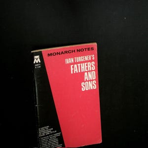May include: A Monarch Notes study guide for Ivan Turgenev's Fathers and Sons. The cover features a bold red and black design with white text. The title is clearly printed in white, and the Monarch Notes logo is visible in the top left corner.