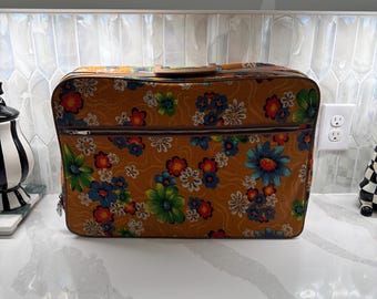 Vintage 70s Zipper Suitcase with Flower Power design and bright COLORS! Good condition with keys! Small spots on canvas as pictured. Retro!