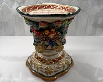 Vinatge Fitz and Floyd Jolly Ole Saint Nick Candle Pillar and Holder in good condition.