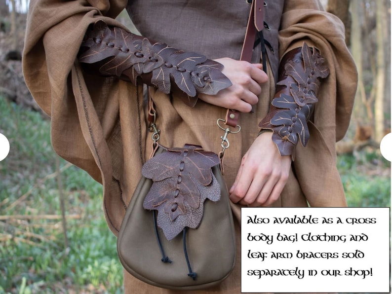 May include: A brown leather bag with leaf-shaped details. The bag is worn over the shoulder and has a strap with a metal clasp. The bag is also available as a cross body bag. Leaf arm bracers are sold separately.