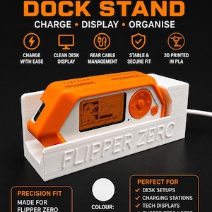 May include: White and orange Flipper Zero dock stand. The stand is 3D printed and designed to charge, display, and organize the Flipper Zero device. Features include rear cable management and a stable fit. The text on the stand reads "FLIPPER ZERO".