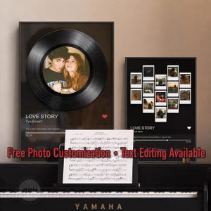 May include: Two framed photo prints with the text "LOVE STORY" by Taylor Swift. One features a photo in a vinyl record design, the other displays multiple polaroid-style photos. Sheet music and a piano are in the foreground.