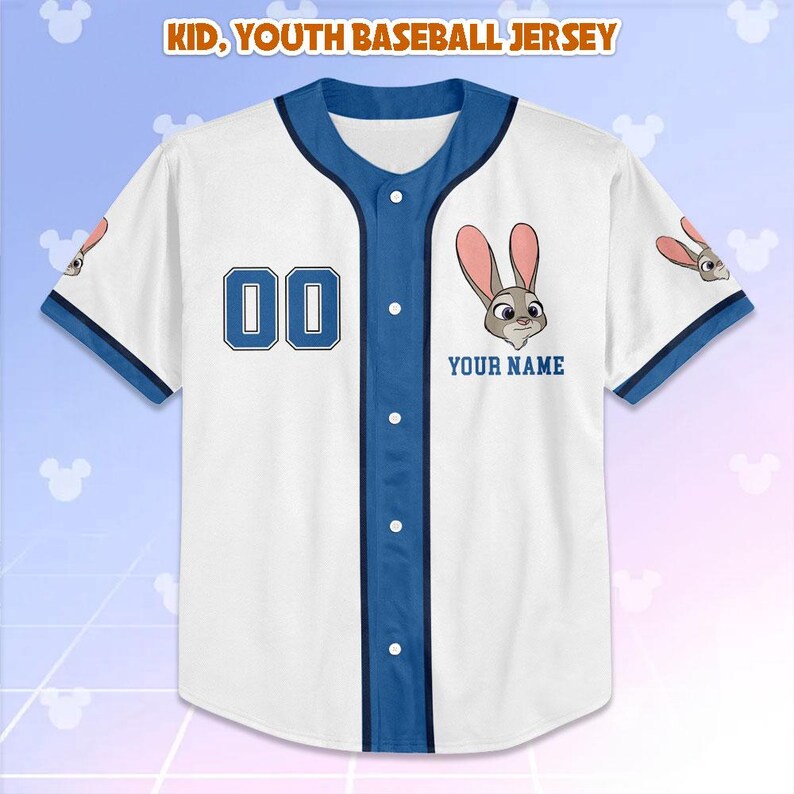 May include: White and blue baseball jersey with the text "KID, YOUTH BASEBALL JERSEY". The jersey features a cartoon rabbit graphic, the number "00", and the text "YOUR NAME".