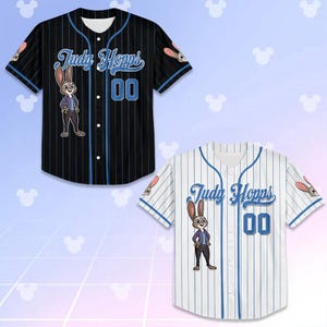 May include: Two baseball jerseys, one black and one white, both featuring a cartoon image of Judy Hopps. The black jersey has blue pinstripes and the text "Judy Hopps" and the number "00" in blue. The white jersey has blue pinstripes and the same text and number.