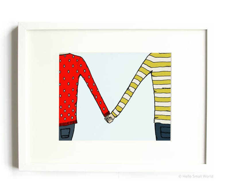 May include: Two people holding hands, one wearing a red sweater with white polka dots and the other wearing a yellow and white striped sweater. The image is framed in white.