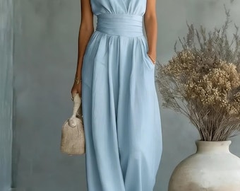Mono sin mangas con escote en V y pernera ancha, estilo lino, con bolsillos, ideal para invitadas a bodas de verano.