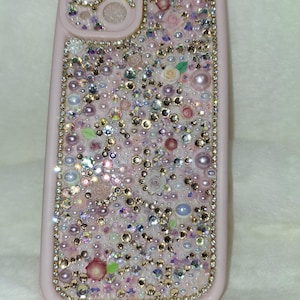 May include: A white ceramic mug with a black handle and the text "But First, Coffee" in a handwritten style. The mug is likely for hot beverages and has a glossy finish.