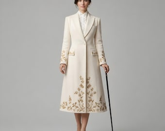 Abito lungo avorio ricamato, elegante abito da cerimonia sartoriale per ricevimento nuziale.