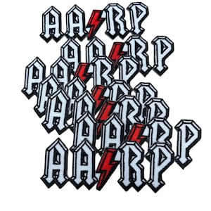 May include: A collection of embroidered patches. Each patch features the letters "AARP" in a gothic font, outlined in white with a black border. A red lightning bolt graphic is incorporated into the design.