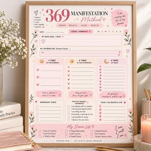 May include: A framed 369 Manifestation Method planner sheet with a light pink and white colour scheme. The document features sections for daily goals, affirmations, and structured writing prompts for morning, afternoon, and night, decorated with floral accents.