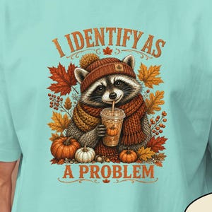 Funny Raccoon Fall T‑Shirt • Cozy Autumn Pumpkins Leaves Cute Woodland Animal • I Identify as a Problem Graphic Tee for Fall Lovers