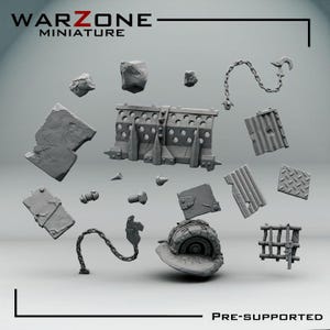 May include: A collection of grey resin miniature terrain components including a spiked barricade, two chains, various rubble pieces, a circular hatch, a small metal grate, and corrugated metal sheets. The text WARZONE MINIATURE and PRE-SUPPORTED appears.