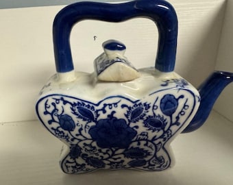 Vintage Blue and White Ceramic Teapot with Floral Design
