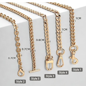 May include: Five gold-toned metal chains of varying link designs and widths, labeled Style 1 through Style 5. The chains feature lobster claw clasps or a T-bar toggle, with visible width measurements of 0.7cm, 0.8cm, and 1cm printed on the image.