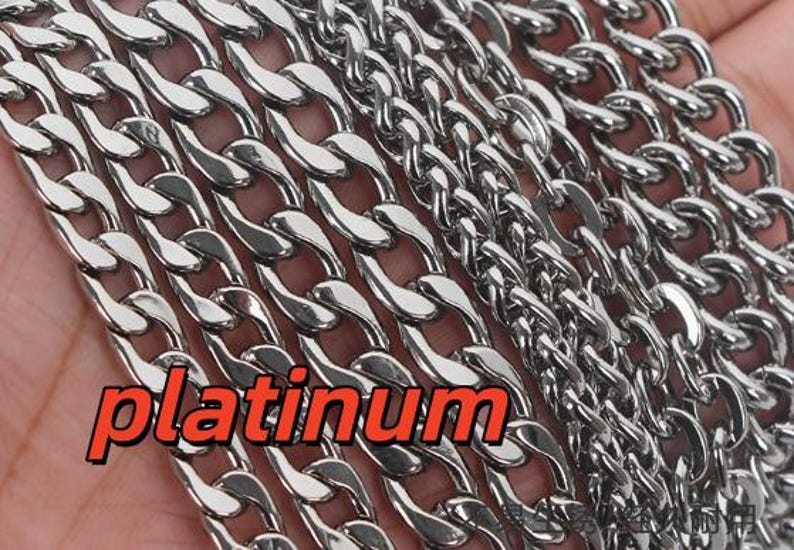 May include: A collection of silver-toned metal chains featuring various link sizes and styles, including thick curb links and thinner, more intricate chain designs. The word platinum is displayed in orange text across the lower left section.