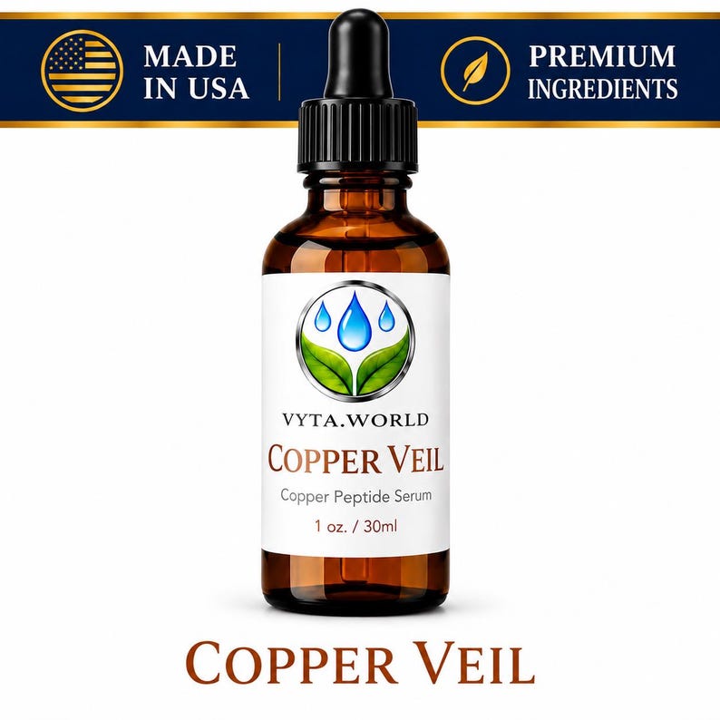 May include: A brown glass dropper bottle of Vyta.World Copper Veil Copper Peptide Serum, 1 oz. The label features a blue water drop and green leaf logo. Above the bottle, a banner displays Made in USA and Premium Ingredients text.