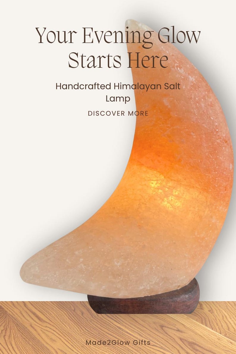 May include: A crescent moon-shaped Himalayan salt lamp with a textured orange surface on a dark wooden base. Text reads: Your Evening Glow Starts Here, Handcrafted Himalayan Salt Lamp, DISCOVER MORE, and Made2Glow Gifts.
