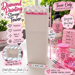 May include: A white, vertical, rectangular storage tower with a scalloped top edge and the text Pearl Blooms Studio Co. printed on the front. The tower measures 12 inches tall and 4 inches wide, featuring a hollow interior for organizing craft supplies.