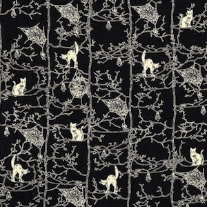 May include: Black fabric with a repeating pattern of white cats, spiderwebs, and tree branches. The cats are in various poses, some sitting and some standing. The spiderwebs are geometric shapes.