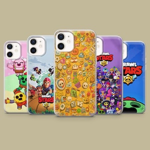 May include: A collection of five phone cases featuring colorful designs from the game Brawl Stars. Each case showcases different characters and themes, with vibrant colors and detailed graphics. The cases are designed to fit a smartphone.