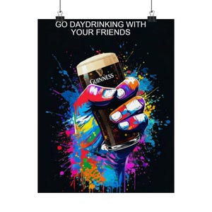 May include: Poster with the text "GO DAYDRINKING WITH YOUR FRIENDS". The image features a colorful hand holding a pint of Guinness stout. The hand is painted with vibrant colors, and the background has colorful paint splatters.