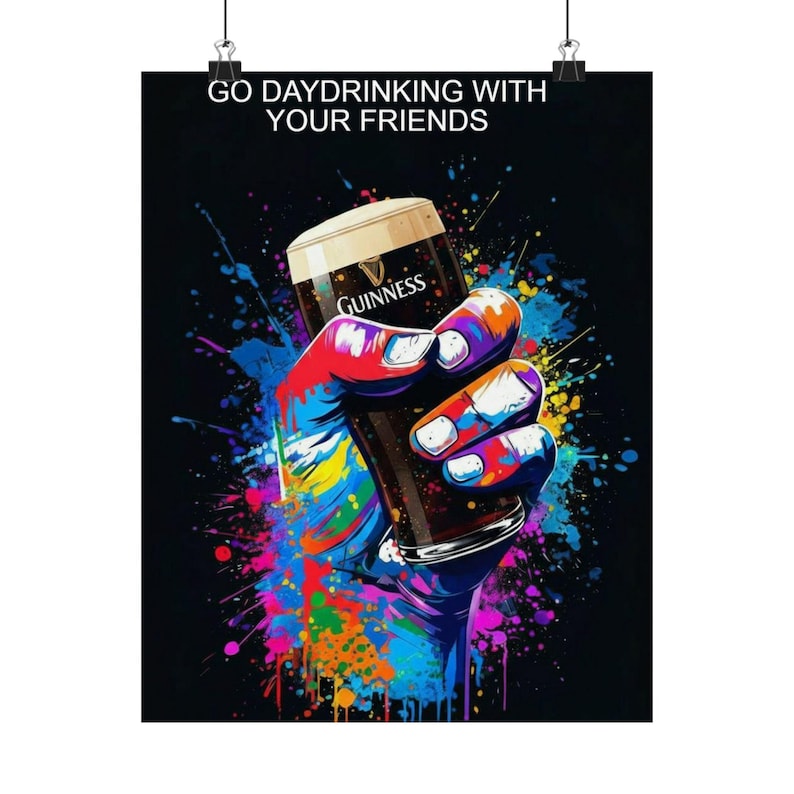 May include: Poster with the text "GO DAYDRINKING WITH YOUR FRIENDS". The image features a colorful hand holding a pint of Guinness stout. The hand is painted with vibrant colors, and the background has colorful paint splatters.