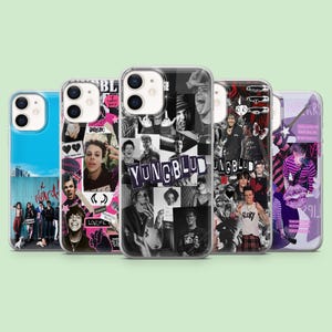 May include: A collection of five phone cases with unique designs. The cases feature a variety of images, including a collage of faces, text, and graphic elements. The cases are in shades of blue, black, white, pink, and purple.