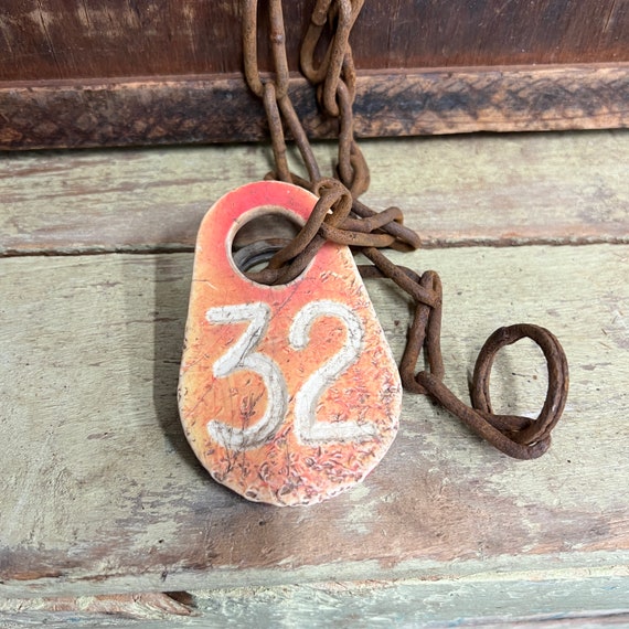 Vintage plastic cow tag on a chain – number 32  -antique plastic livestock ID tag – plastic bull tag – cattle tag – industrial number -
