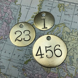 Custom hand punched round brass tag -  hand stamped key tag - hand made key fob - hotel key tag - pet tag - numbered and lettered metal tags