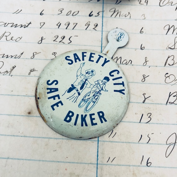Vintage Safe Biker tin fold back pin - button - antique tin toy button - vintage advertisement button pinback badge