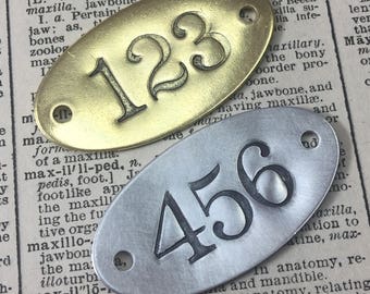 Hand punched Oval brass or aluminum numbered tags -  2x1 Custom numbered locker tags - oval year date number plates - hotel room