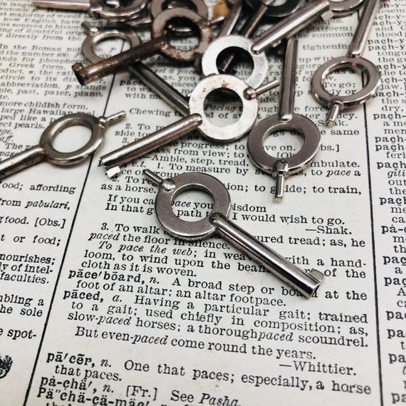 Small vintage handcuff key - vintage key for handcuffs - vintage hollow barrel key charm – steampunk key rustic skeleton key
