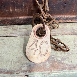 Vintage plastic cow tag on a chain – number 40 -antique plastic livestock ID tag – plastic bull tag – cattle tag – industrial number -