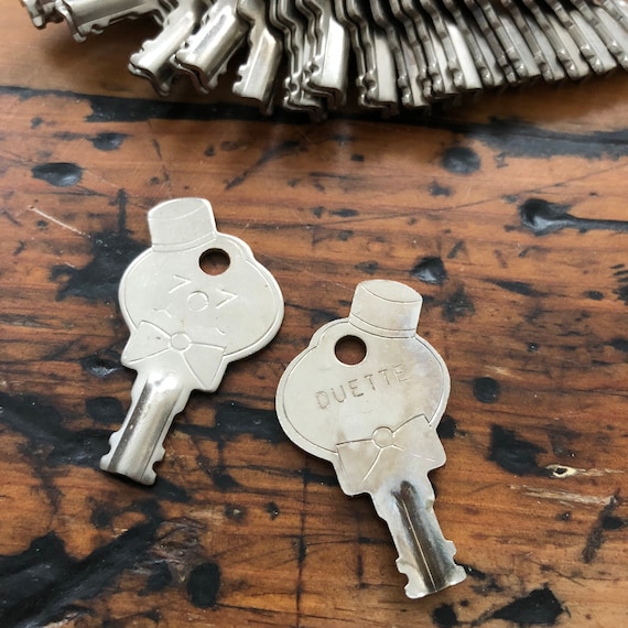 Small American tourister Duette key  - Unique luggage or suitcase key - vintage key charm - old key